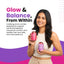 An advertisement for Free on gummy supplements featuring a smiling woman holding two bottles. The top bottle is labeled "Gummies for Hair and Nails," and the bottom bottle is for "Ovarian health and Menstrual Cycle." The text on the left reads, "Glow & Balance, From Within," describing a daily gummy combo designed to support hormonal balance, menstrual comfort, and healthy hair and nails. The design uses a clean white background with vibrant pink and purple wave accents.