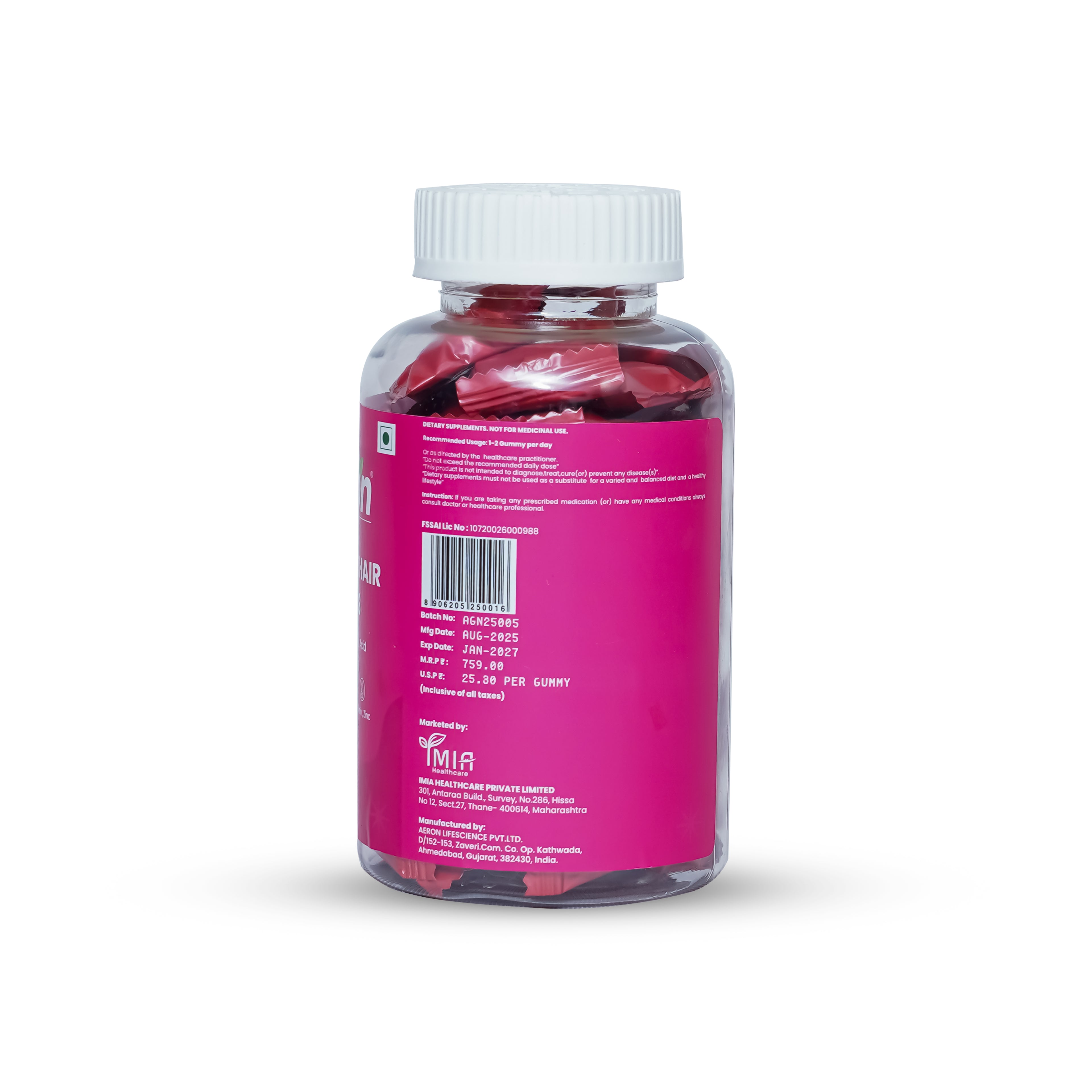 Bottle of pink capsules with a white cap on a white background