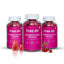 Three bottles of Free on Gummies for Hair and Nails with gummy bears and cherries on a white background