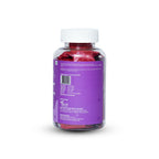 Bottle of supplements with a purple label on a white background