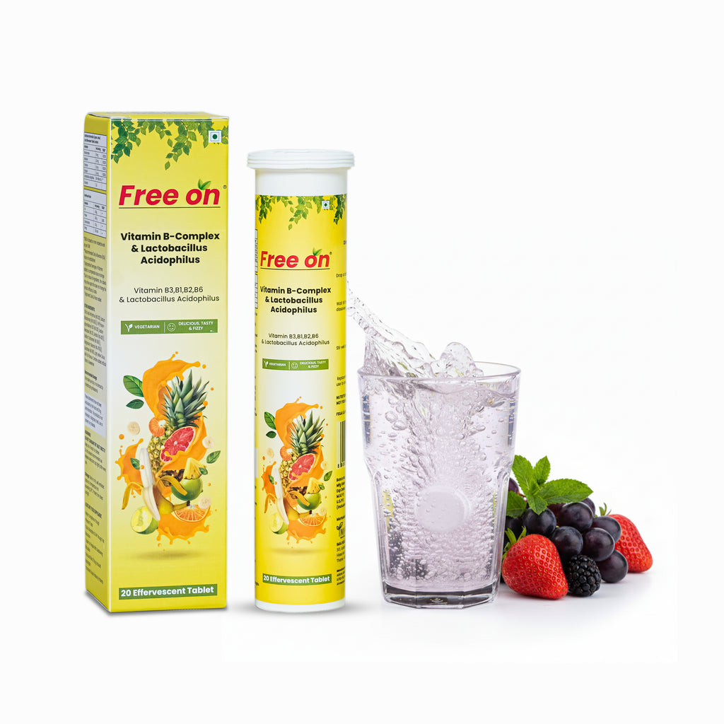 Free'on Vitamin B-Complex & Lactobacillus Acidophilus packaging with a glass of water and fruits on a white background