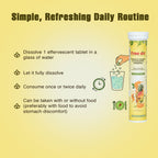 Free On effervescent tablet packaging with 4 step usage instructions on a yellow background. dissolve one tablet in a glass of water, let it fully dissolve, consume once or twice daily, and take with or without food preferably with food to avoid stomach discomfort. Features an illustration of a hand dropping a green tablet into a glass of water alongside icons for a clock and a meal and a bold title on top center of image Simple, Refreshing Daily Routine